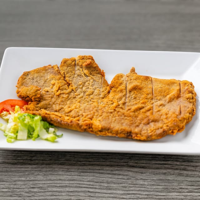Bistec De Puerco Empanizado.