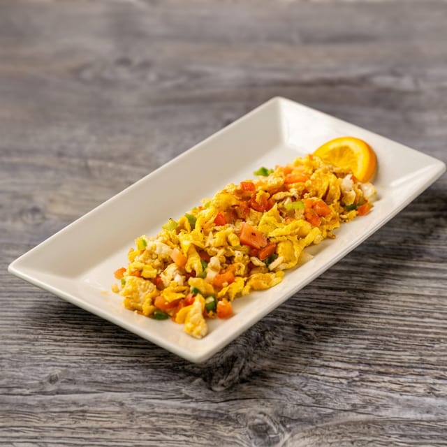 Dos Huevos Revueltos Al Periquito.