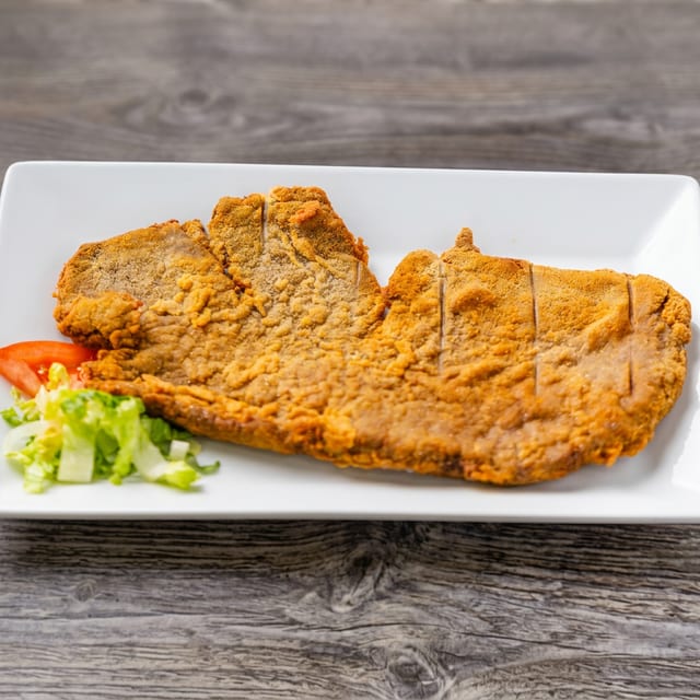 Bistec De Puerco Empanizado.